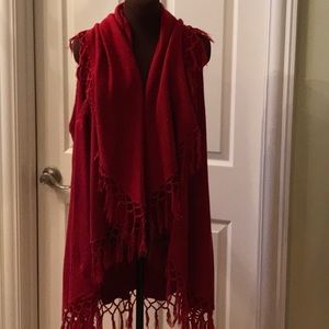 Dark red long vest with fringes.